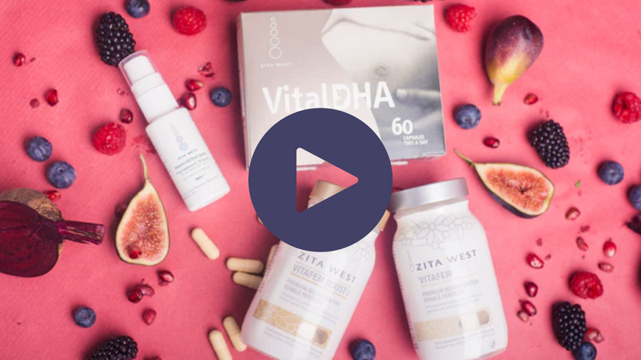 Zita West VitalDHA and Vitafem supplement bottles surrounded by fresh berries and figs
