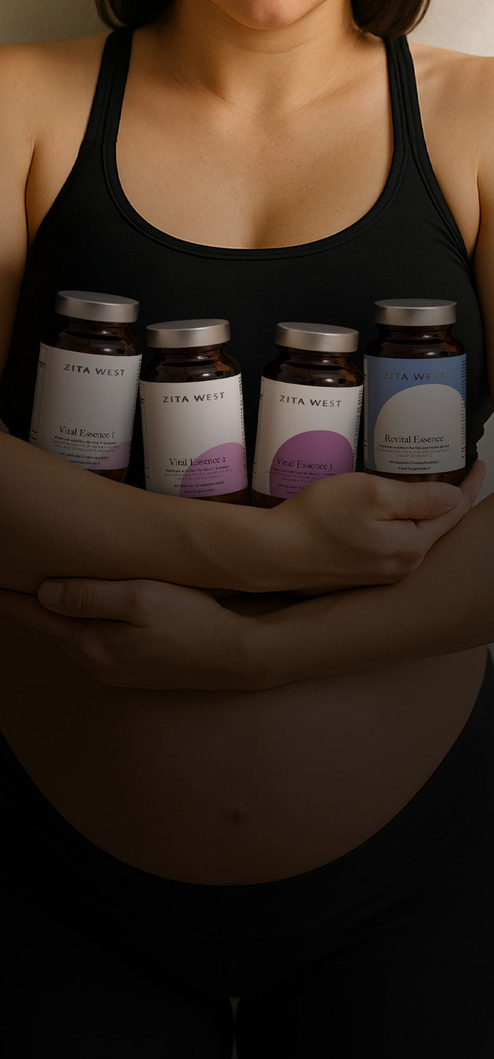 A woman in a black tank top holding the Zita West Vital Essence Range of supplements