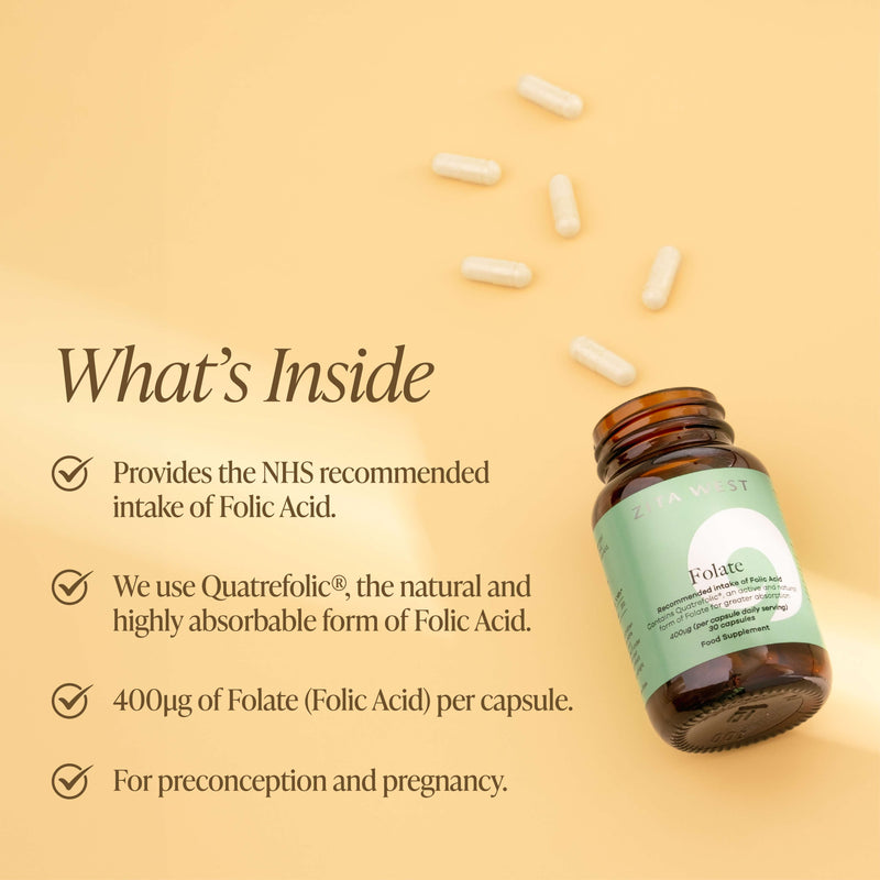 A bottle of Zita West Folate open with capsules on a yellow background