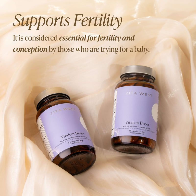 Two bottles of Zita West Vitafem Boost on a neutral background