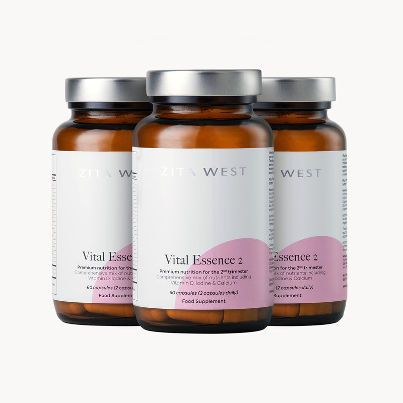 Three bottles of Zita West Vital Essence 2 on a white background