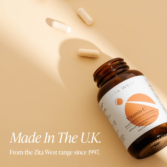 Zita West Vitamin C bottle on a beige background with text noting it is made in the UK